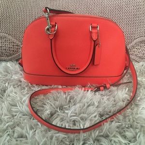 Coach bright coral cross body purse!